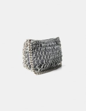 Tasche mit silberfarbenen Garnen